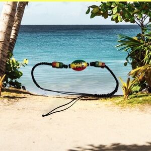 Unbranded 'One Love' Black adjustable Thread red green yellow beaded Bracelet